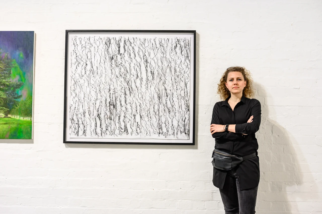 Olga Dziemidowicz beside Celebrating 1029363